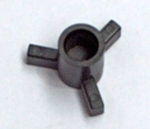 Schwarzer, kreuzförmiger Adapter mit einer zentralen Vertiefung und drei abstehenden Armen. Es könnte sich um einen Zusatzadapter von Daikin handeln.